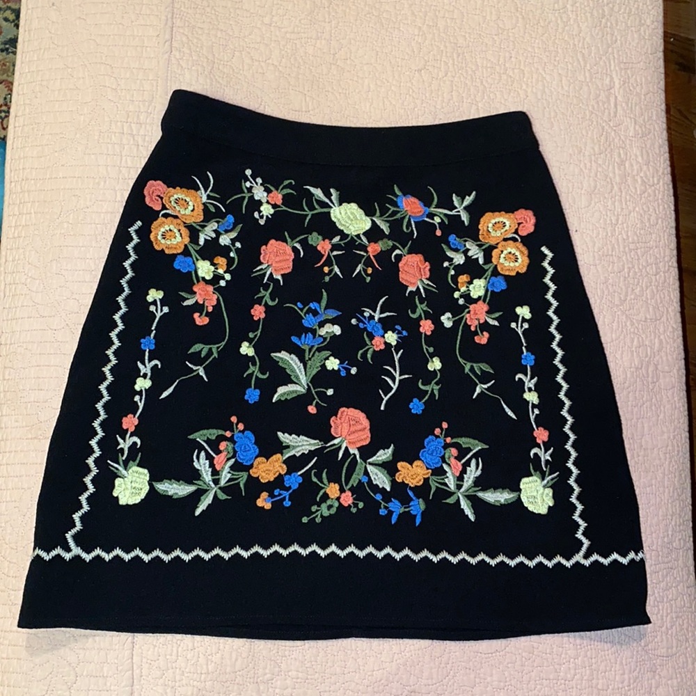 Sugarlips Black skirt w embroidered flowers in extra small; like new condition.